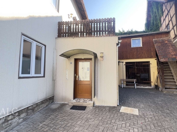 Eingang Haus 38 und Blick auf Heizungsraum