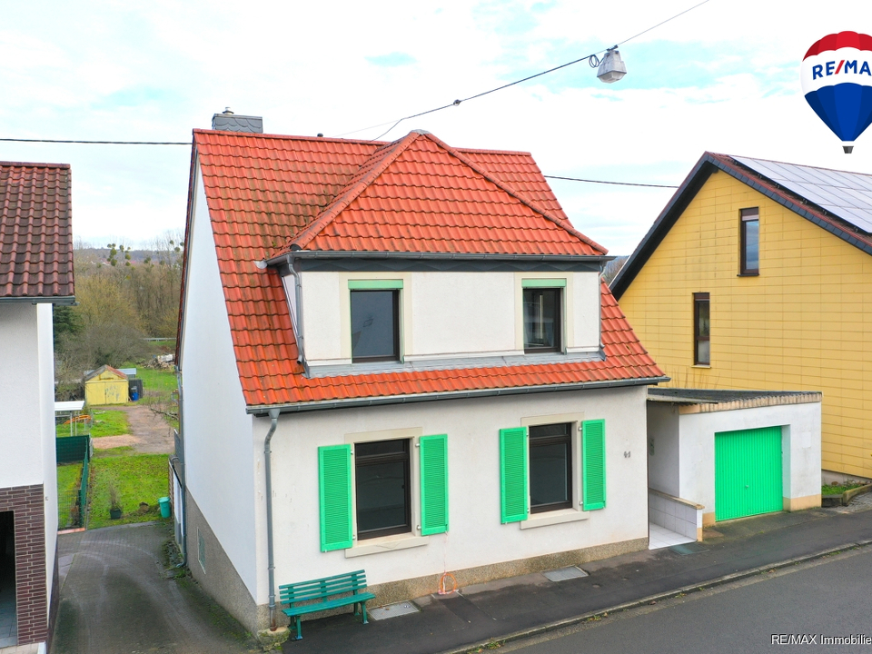 RE/MAX Immobilien DeLux