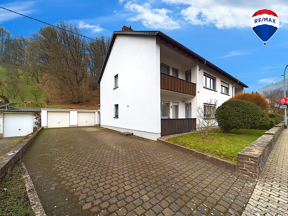 RE/MAX Immobilien DeLux