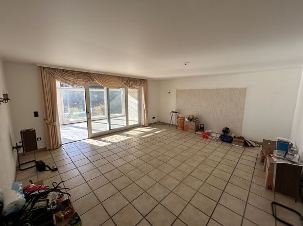 Wohnzimmer mit Wintergarten EG