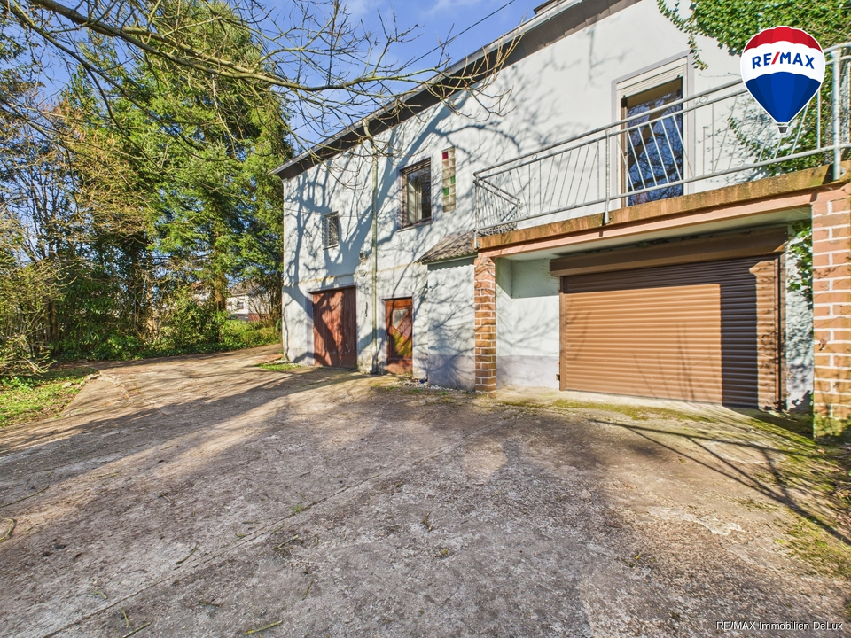 Remax Immobilien DeLux Buweiler Rückansicht