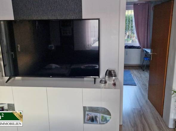 Wohnzimmer mit Blick ins Kinderzimmer EG