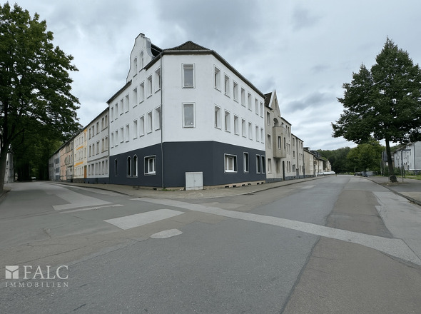 A_photograph_captures_a_daytime_street_scene_at_th