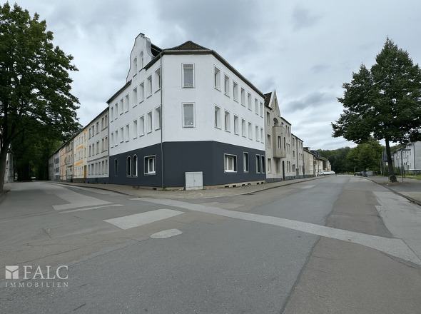 A_photograph_captures_a_daytime_street_scene_at_th