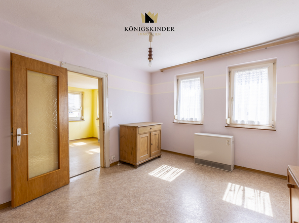 Schlafzimmer- Rückzugsort mit Ruhe – großzügiges Schlafzimmer mit Blick ins Grüne