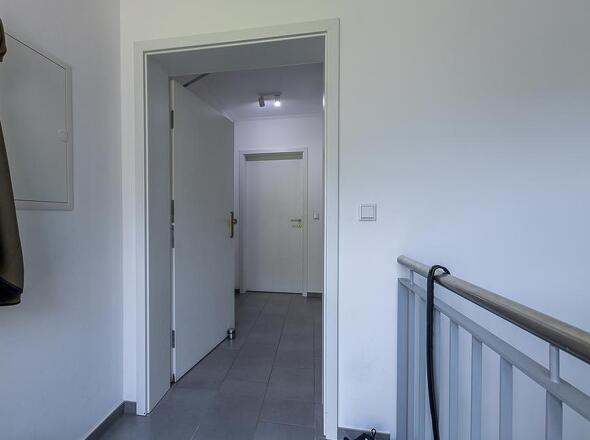 Treppenhaus mit Wohnungseingang