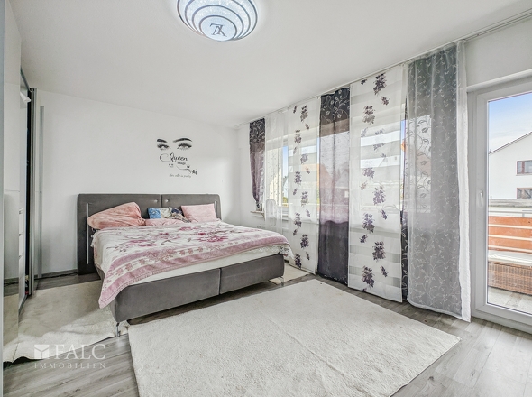 Schlafzimmer mit Balkon