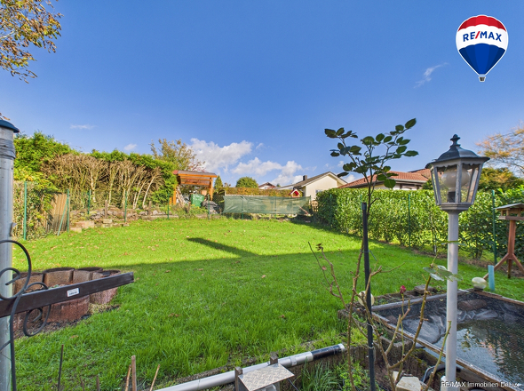 RE/MAX Immobilien DeLux Einfamilienhaus Niederlosheim Garten