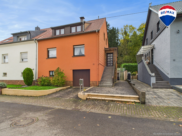 RE/MAX Immobilien DeLux Einfamilienhaus Körprich Außenansicht