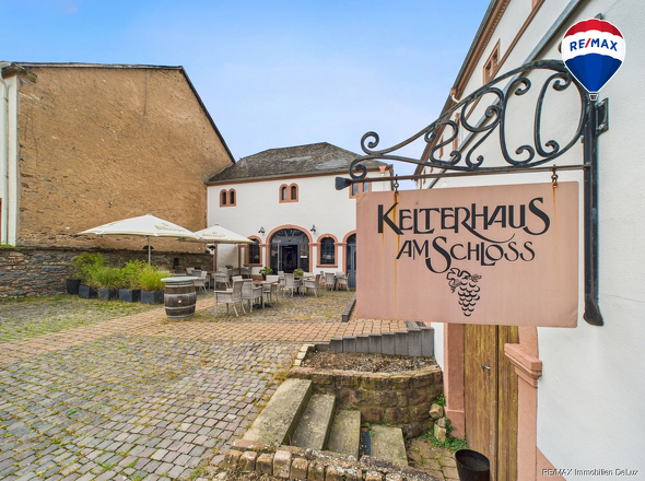 RE/MAX Immobilien DeLux Kelterhaus Gaststätte am Schloss Ayl