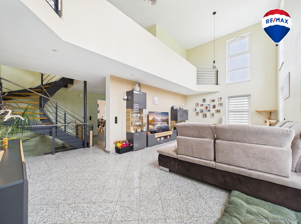 RE/MAX Immobilien DeLux Einfamilienhaus Mettlach-Weiten Wohnzimmer