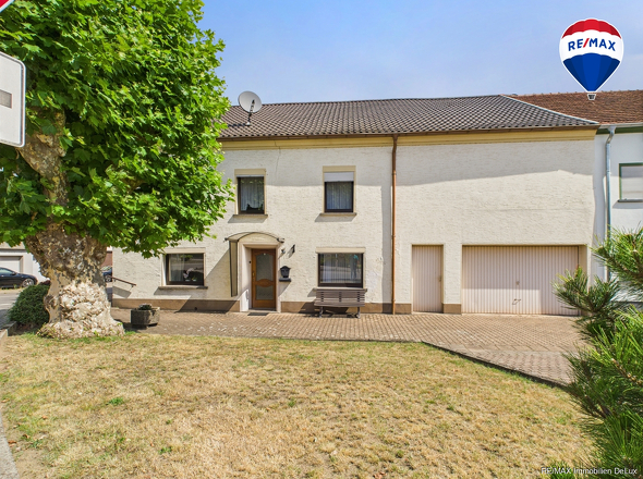 RE/MAX Immobilien DeLux Haus in Losheim am See/ Bachem 