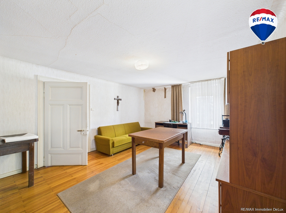 RE/MAX Immobilien DeLux Haus in Losheim am See/ Bachem 