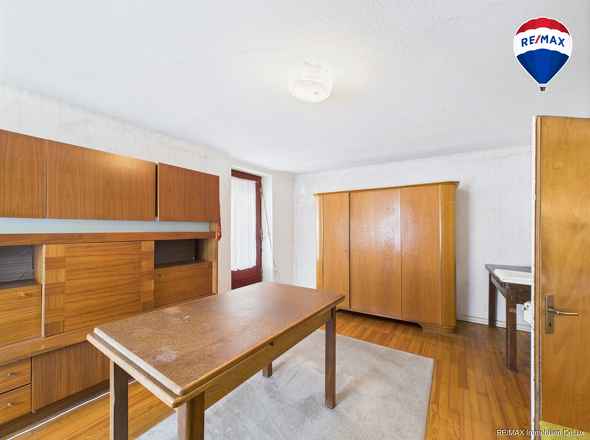 RE/MAX Immobilien DeLux Haus in Losheim am See/ Bachem 