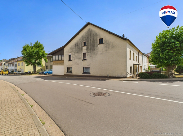 RE/MAX Immobilien DeLux Haus in Losheim am See/ Bachem 