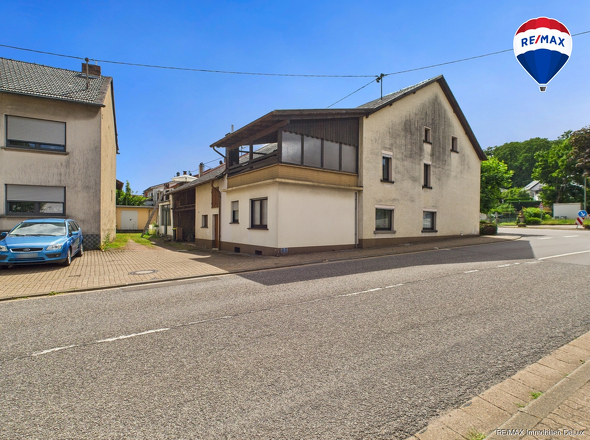RE/MAX Immobilien DeLux Haus in Losheim am See/ Bachem 