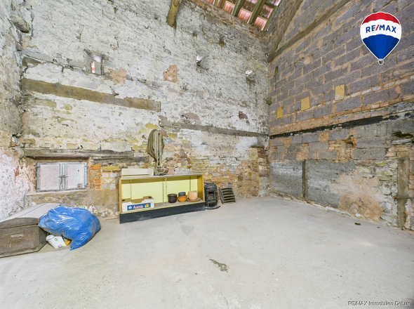 RE/MAX Immobilien DeLux Haus in Losheim am See/ Bachem 