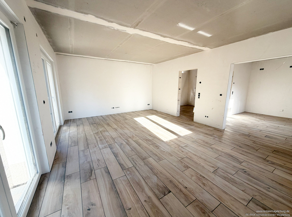 Wohnzimmer mit extra Küchenbereich