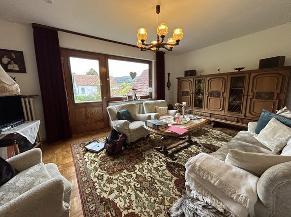 Wohnzimmer mit Zugang zur Terrasse