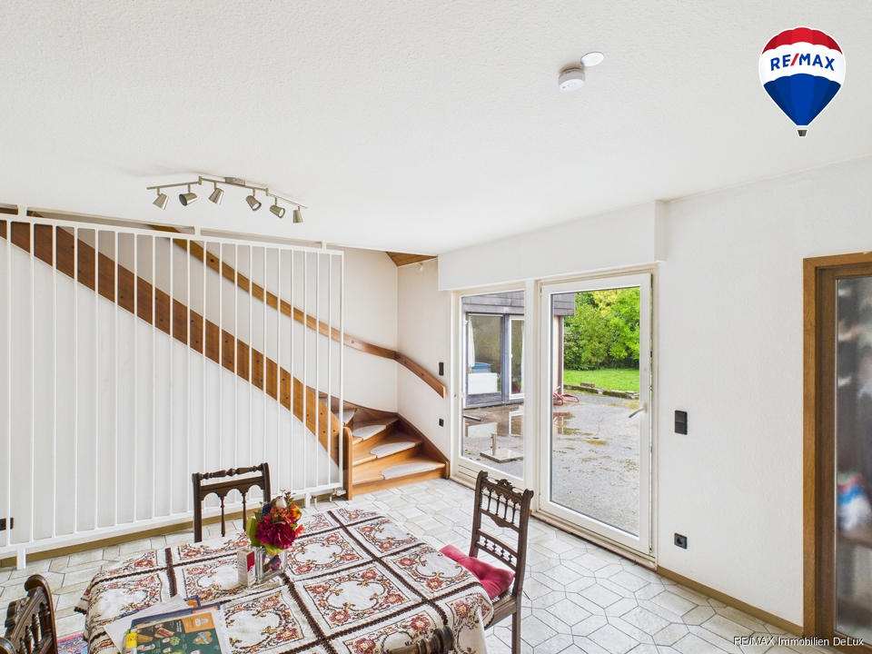 RE/MAX Immobilien DeLux Einfamilienhaus Wallerfangen-Oberlimberg Aufgang Studio