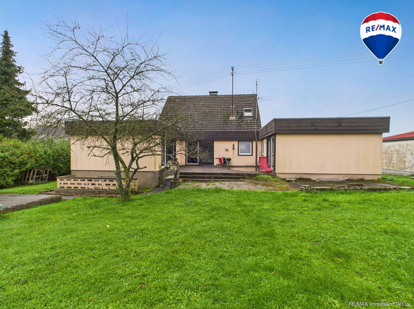 RE/MAX Immobilien DeLux Einfamilienhaus Wallerfangen-Oberlimberg Hinten 1