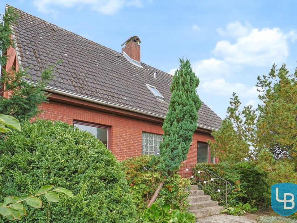 Eingewachsenes Einfamilienhaus