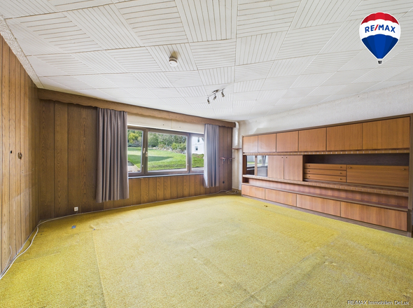 RE/MAX Immobilien DeLux Einfamilienhaus Nalbach Wohnzimmer
