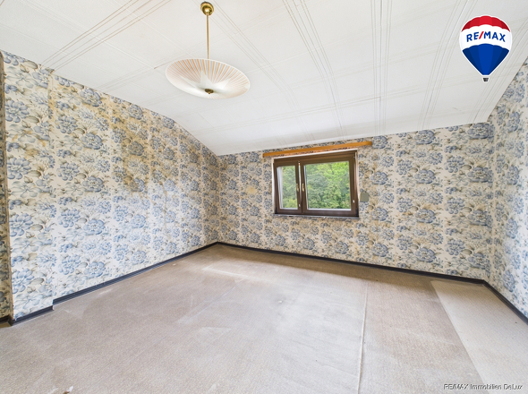 RE/MAX Immobilien DeLux Einfamilienhaus Nalbach Schlafzimmer