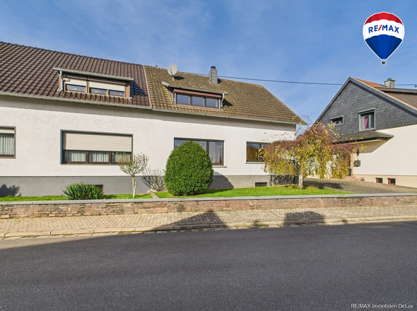 RE/MAX Immobilien DeLux Soppelhaushälfte Mettlach