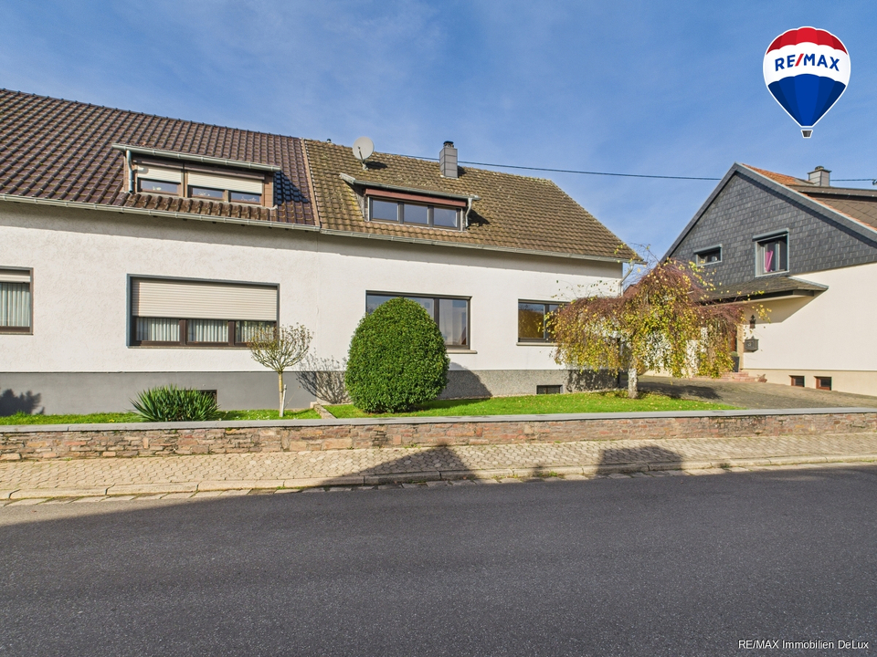 RE/MAX Immobilien DeLux Soppelhaushälfte Mettlach