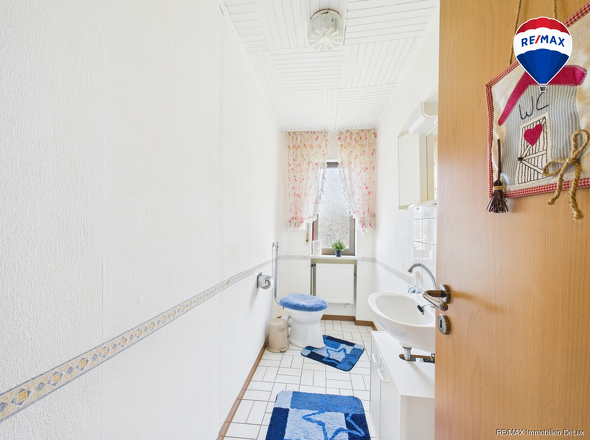 RE/MAX Immobilien DeLux Einfamilienhaus Merzig-Besseringen Gäste-WC