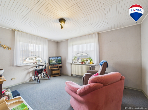 RE/MAX Immobilien DeLux Einfamilienhaus Merzig-Besseringen Wohnzimmer