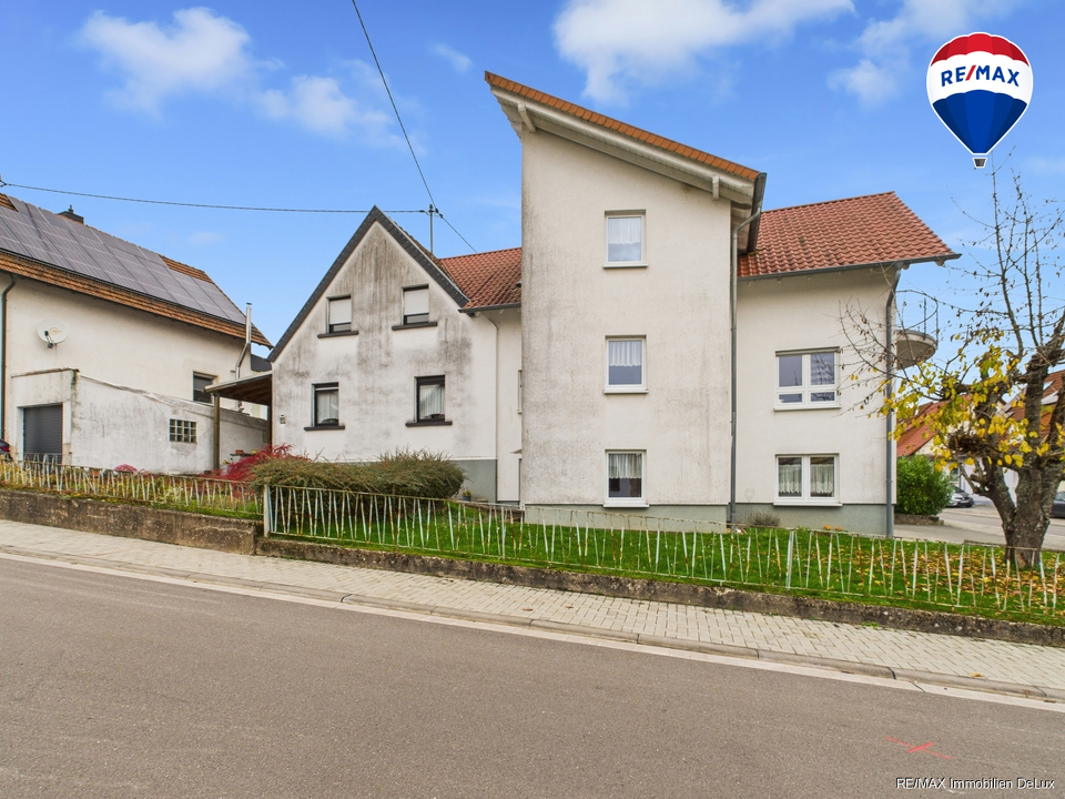 RE/MAX Immobilien DeLux Zweifamilienhaus Lebach - Steinbach 