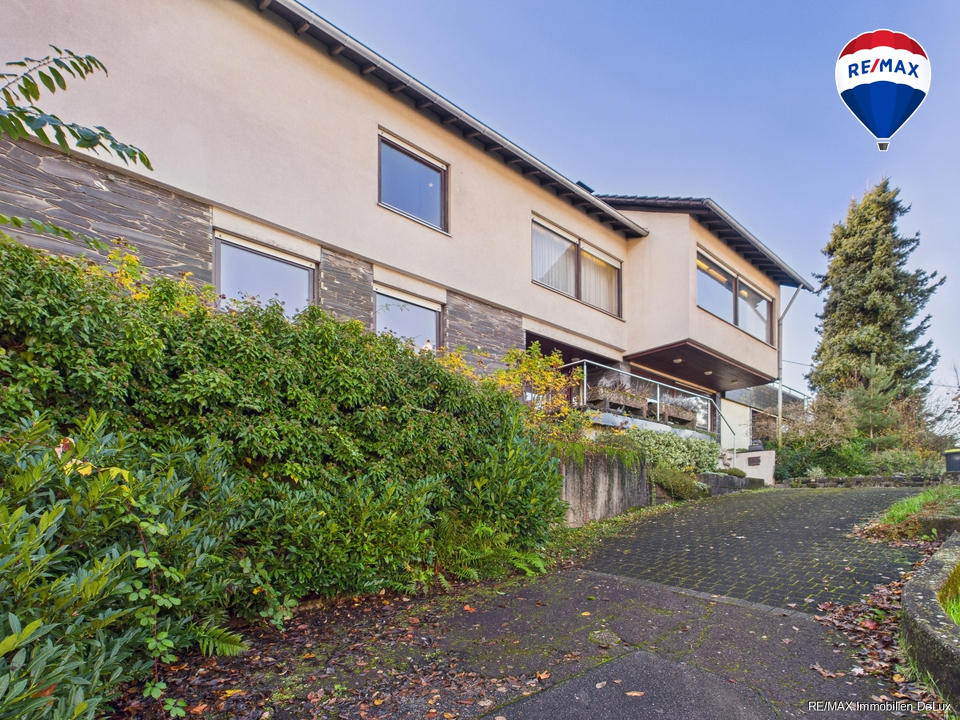 RE/MAX Immobilien DeLux Wohn-Geschäftshaus Merzig 