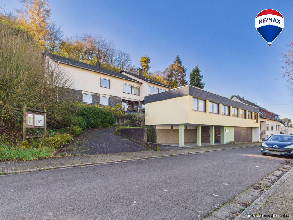 RE/MAX Immobilien DeLux Wohn-Geschäftshaus Merzig 