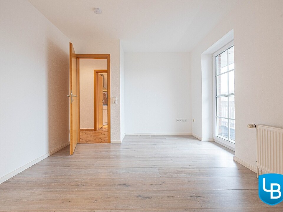 Schlafzimmer mit Zugang zur Loggia