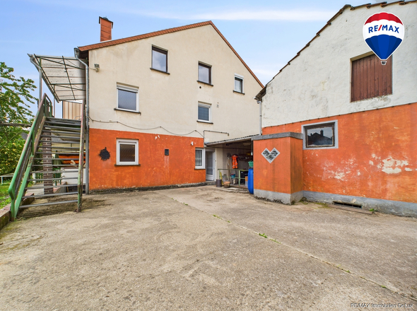 RE/MAX Immobilien DeLux Haus Merzig / Besseringen Rückansicht