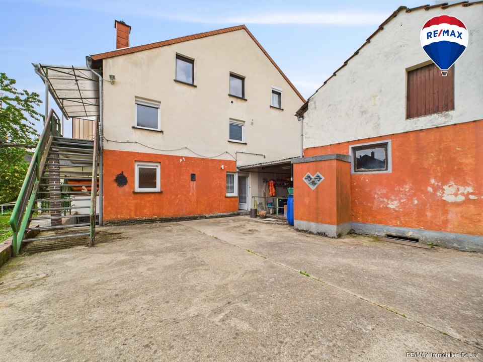 RE/MAX Immobilien DeLux Haus Merzig / Besseringen Rückansicht