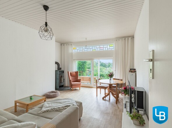 Wohn- und Essbereich mit Kamin