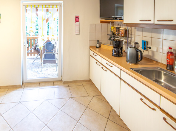 EG Küche mit Ausgang zur überdachten Terrasse