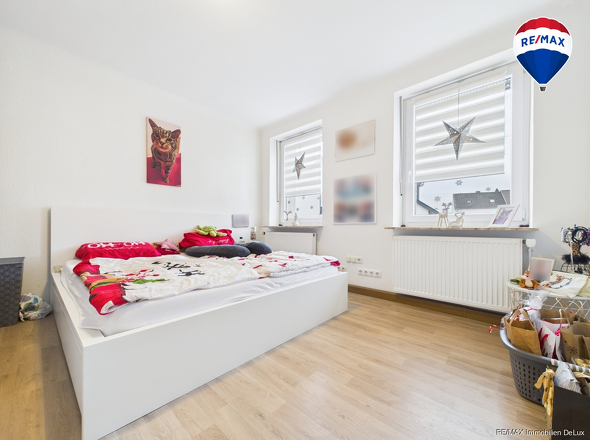 REMAX Immobilien DeLux Eigentumswohnung Schlafzimmer Schwalbach Mark Borowicz
