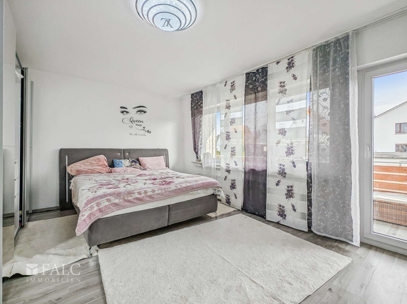 Schlafzimmer mit Balkon