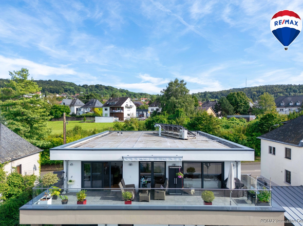 RE/MAX Immobilien DeLux