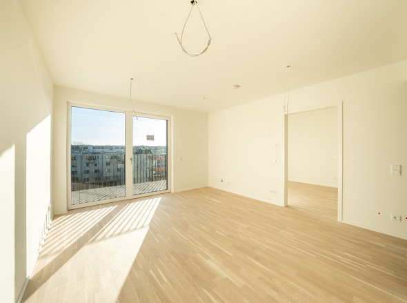 Wohn- und Küchenbereich Ansicht 2 - Zugang zum Balkon