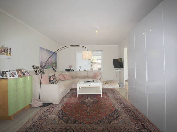 Wohnzimmer mit Zugang Wi.garten u. Schlafzimmer