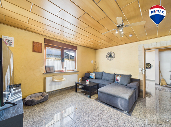 REMAX Immobilien DeLux Einfamilienhaus in Besseringen Wohnbereich