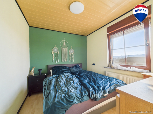 REMAX Immobilien DeLux Einfamilienhaus in Besseringen Schlafzimmer