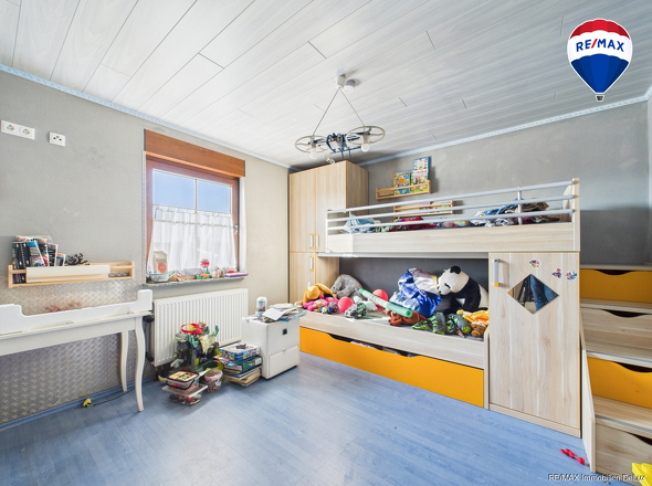 REMAX Immobilien DeLux Einfamilienhaus in Besseringen Kinderzimmer