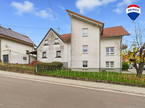 RE/MAX Immobilien DeLux Zweifamilienhaus Lebach - Steinbach 
