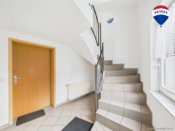 RE/MAX Immobilien DeLux Zweifamilienhaus Lebach - Steinbach 